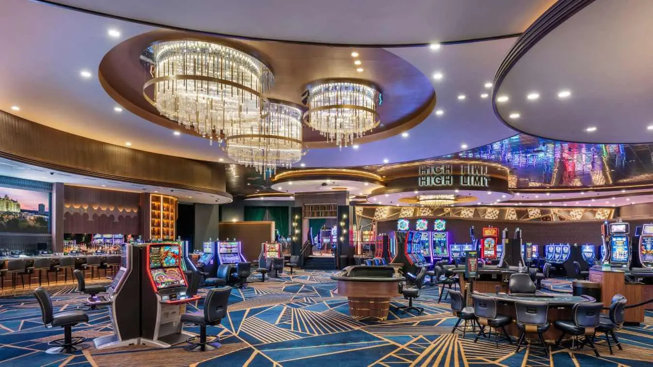 Elegant casino gaming floor with chandeliers and luxury atmosphere